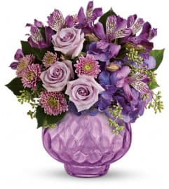 Teleflora's Lush and Lavender with Roses. An arrangement by Pompano Beach Floral.