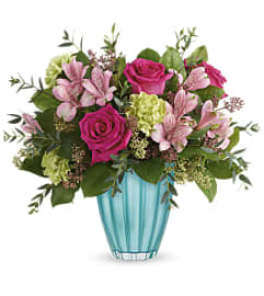 Teleflora's Enchanted Spring Bouquet 2021. An arrangement by Margaret's Florist.