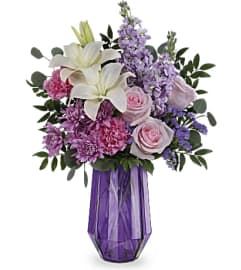 The Teleflora's Lavender Whimsy Bouquet. An arrangement by Dowling Flowers.