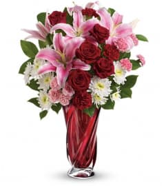 Teleflora's Swirling Beauty Bouquet. An arrangement by Devine Orchid.