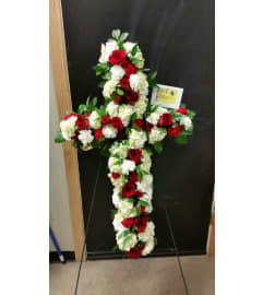 RED and WHITE CROSS. An arrangement by Gary's Floral Gallery.