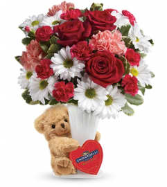 Teleflora's Send a Hug® Bear Your Heart Bouquet. An arrangement by Devine Orchid.