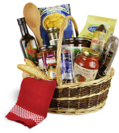 Bon Appetit! Deluxe Basket™. An arrangement by Abundant Flowers and Gift Shoppe.