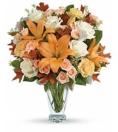 Teleflora's Seasonal Sophistication Bouquet. An arrangement by Wasaga Flowers.