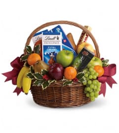 Fruits and Sweets Christmas Basket. An arrangement by Devine Orchid.