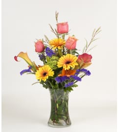 Golden Times. An arrangement by A Plus Flowers and Gifts.