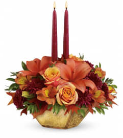 Teleflora's Harvest Gold Centerpiece. An arrangement by Pompano Beach Floral.