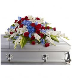 Distinguished Service Casket Spray. An arrangement by Wasaga Flowers.