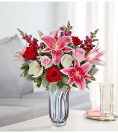 Radiant Devotion. An arrangement by Garden of Eden Floral.