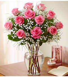 Rose Elegance™ Premium Pink Roses - 1 Dozen. An arrangement by Flowers of Jacksonville.