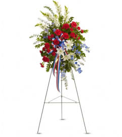 Sacred Duty Spray. An arrangement by Wasaga Flowers.