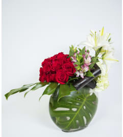Positively Devine. An arrangement by La Petite Florist and Gifts.