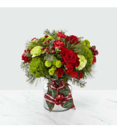 The FTD® Jingle Bells™ Bouquet. An arrangement by Eve's Baskets and More LLC. The FTD® Jingle Bells™ Bouquet. An arrangement by Eve's Baskets and More LLC.