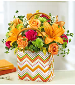 Handbag of Blooms™. An arrangement by Blessing and Blooms Florist.
