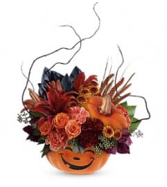 Teleflora's Halloween Magic Bouquet. An arrangement by Marivel's Florist and Gifts.