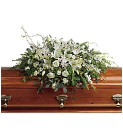 Teleflora's Grandest Glory Casket Spray. An arrangement by Marivel's Florist and Gifts. Teleflora's Grandest Glory Casket Spray. An arrangement by Marivel's Florist and Gifts.