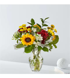 The Prairie Sunrise Bouquet. An arrangement by Country Cousins Flower Shop.
