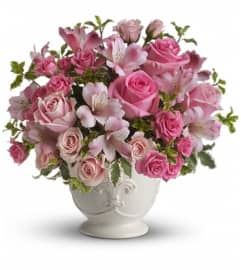 Teleflora's Pink Potpourri Bouquet with Roses. An arrangement by Pompano Beach Floral.