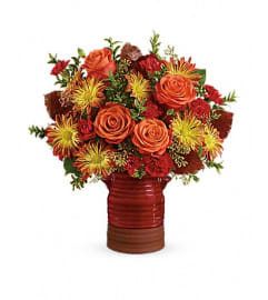 Teleflora's Heirloom Crock Bouquet. An arrangement by Pompano Beach Floral.