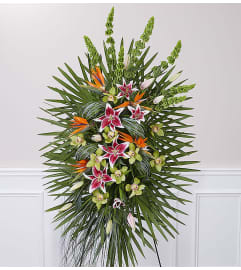 Eternal Paradise™ Standing Spray. An arrangement by Graceland Florist.