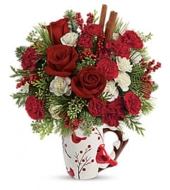 Send a Hug® Christmas Cardinal by Teleflora. An arrangement by Artistic Way Flowers.
