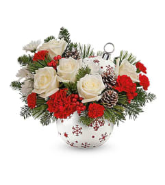 Teleflora's Snowy Sparkle Bouquet. An arrangement by Marivel's Florist and Gifts.