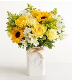 The Honey Bee Buzz™ for Summer. An arrangement by Susana's Flowers. The Honey Bee Buzz™ for Summer. An arrangement by Susana's Flowers.