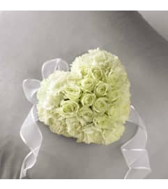 The FTD® Deeply Adored™ Casket Adornment. An arrangement by Ann's Flowers.