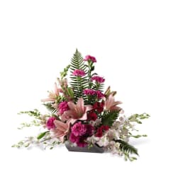 The FTD® Uplifting Moments™ Arrangement. An arrangement by Syd Kemsley Florist.