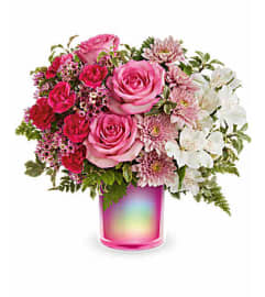 The Teleflora's Gemstone Radiance Bouquet. An arrangement by Marivel's Florist and Gifts.