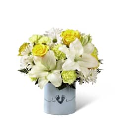 The FTD® Tiny Miracle™ New Baby Boy Bouquet. An arrangement by Believe Flowers.