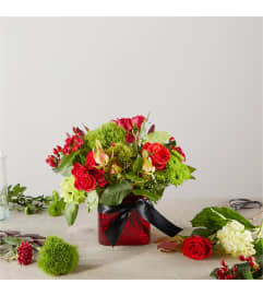 Heritage Kindle – A Florist Original. An arrangement by Pierson's Flower Shop and Greenhouses.