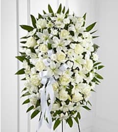 elegant white blooms. An arrangement by Fine's Flowers. elegant white blooms. An arrangement by Fine's Flowers.