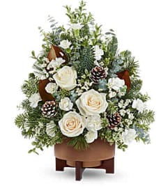 The Teleflora's Alpine Snow Tree. An arrangement by Marivel's Florist and Gifts.