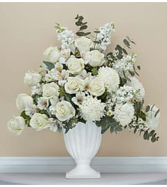 On Angel's Wings™. An arrangement by Blessing and Blooms Florist.