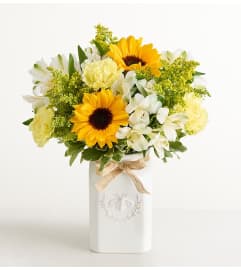 The Honey Bee Buzz™ for Summer. An arrangement by Garden of Eden Floral.