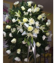 Beautiful White spray. An arrangement by Hialeah Flowers.
