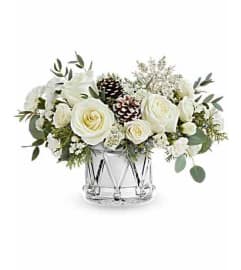 The Teleflora's Sparkling Wishes Bouquet. An arrangement by Marivel's Florist and Gifts.