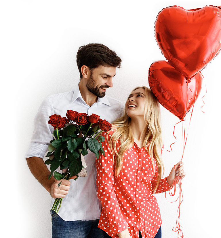A couple with the man holding flowers and girl holding balloons A couple with the man holding flowers and girl holding balloons
