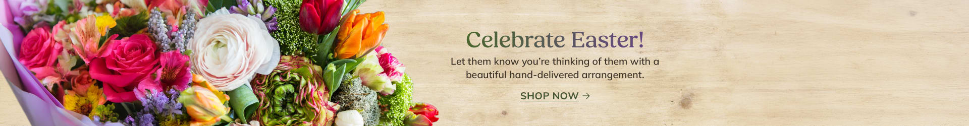 Multicolor Easter flower bouquet on a dark wood background - flower delivery in Toronto