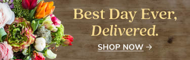 Colorful bouquet on wood with yellow text - flower delivery in Worcester