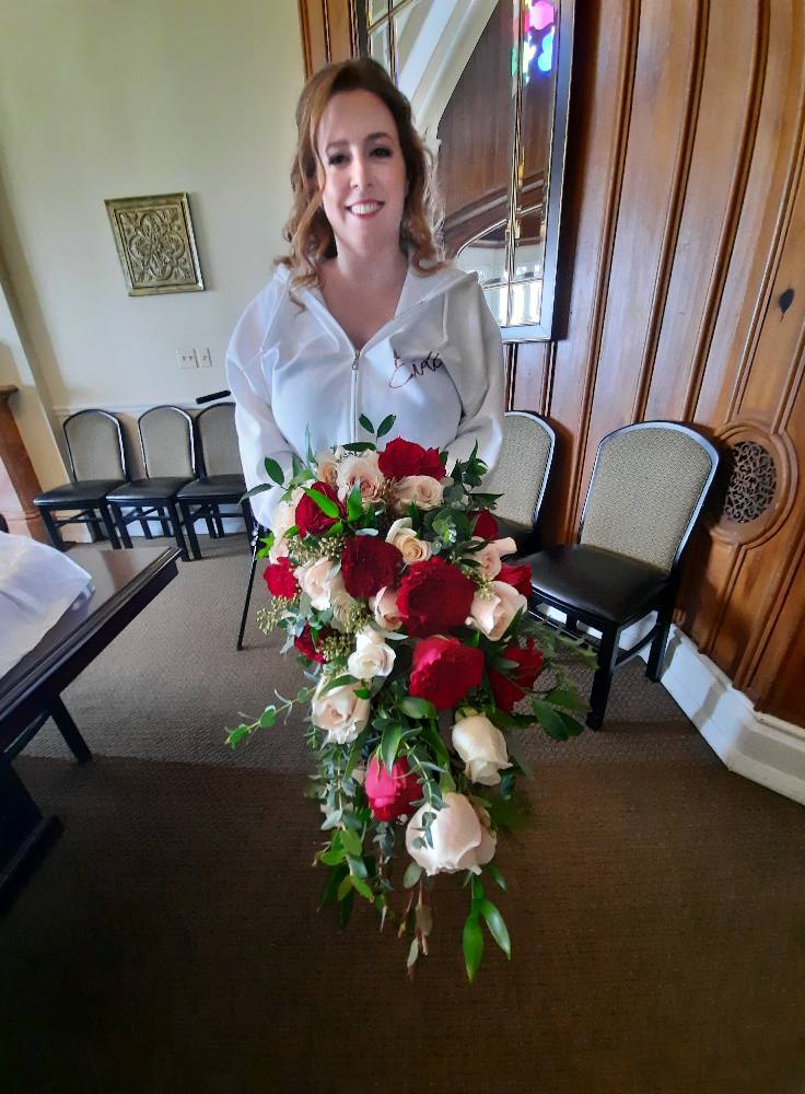 Bride holding custom bouquet