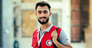 Un volontaire du Croissant-Rouge arabe syrien remporte la troisième place au concours "Meilleure photo illustrant l'action humanitaire et de secours".