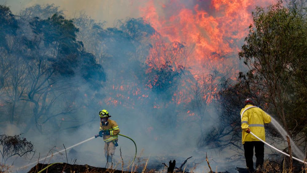 Massive fires engulf thousands of acres near Jerusalem, and Israel seeks international support.