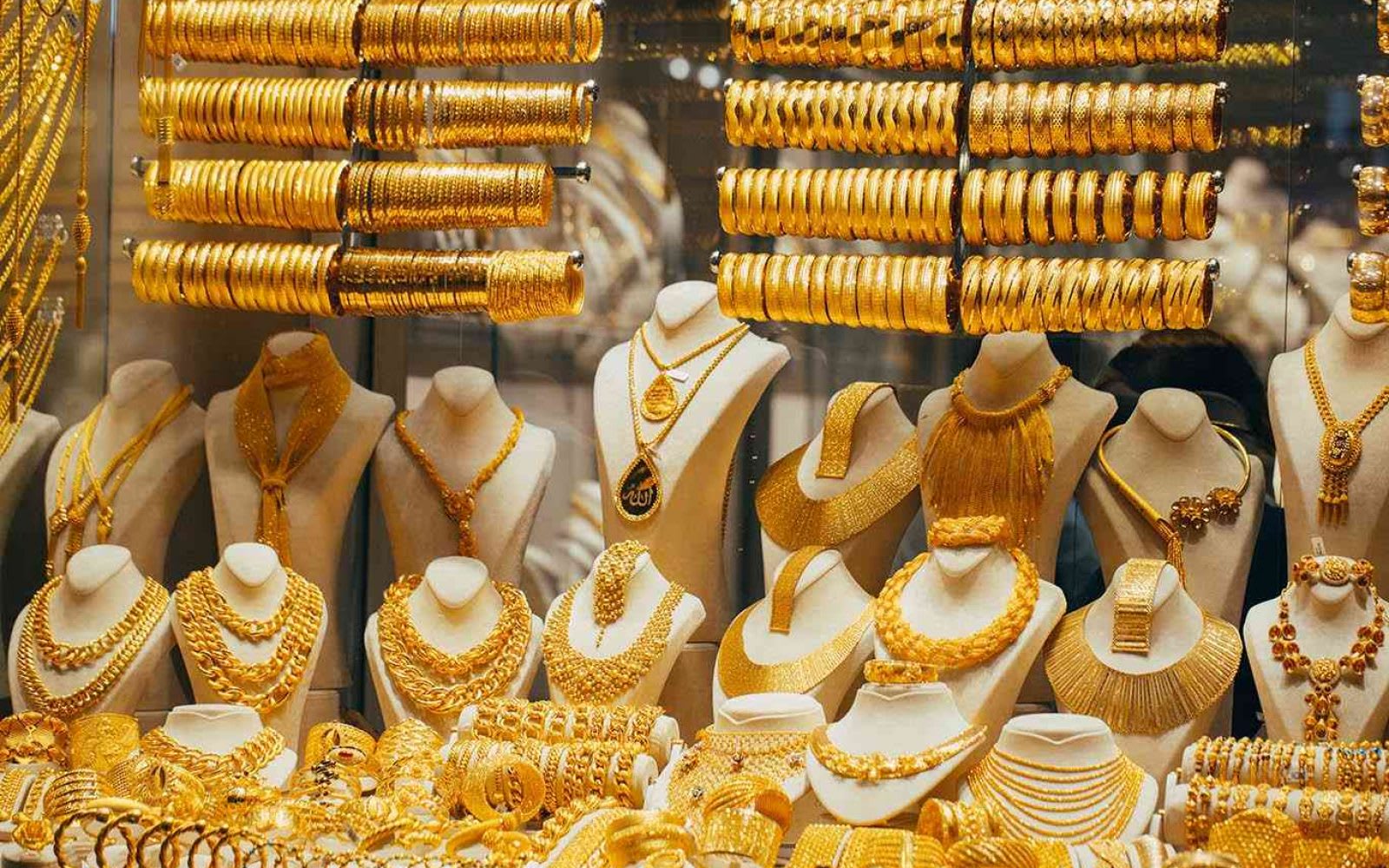 Gold prices retreated as the dollar recovered and optimism grew about a ceasefire between Russia and Ukraine.
