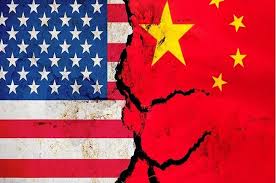 China threatens to respond "firmly" to the new US restrictions on electronic chip imports.