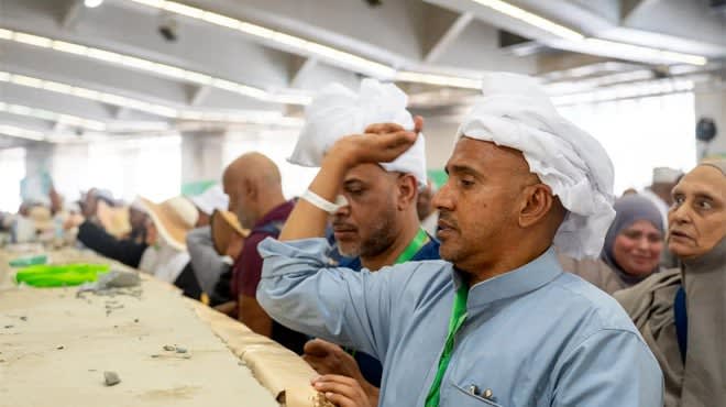 Pilgrims at the Sacred House of Allah are stoning the three pillars on the third day of Tashreeq.