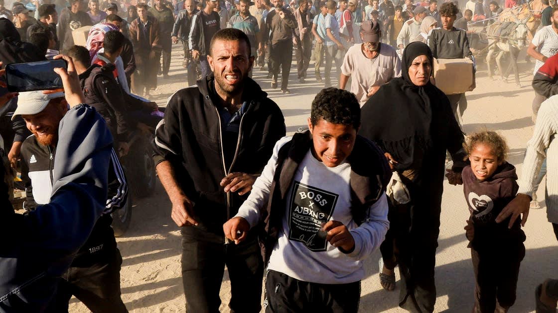 Israel once again targets civilians in Gaza while distributing aid, resulting in deaths and injuries.