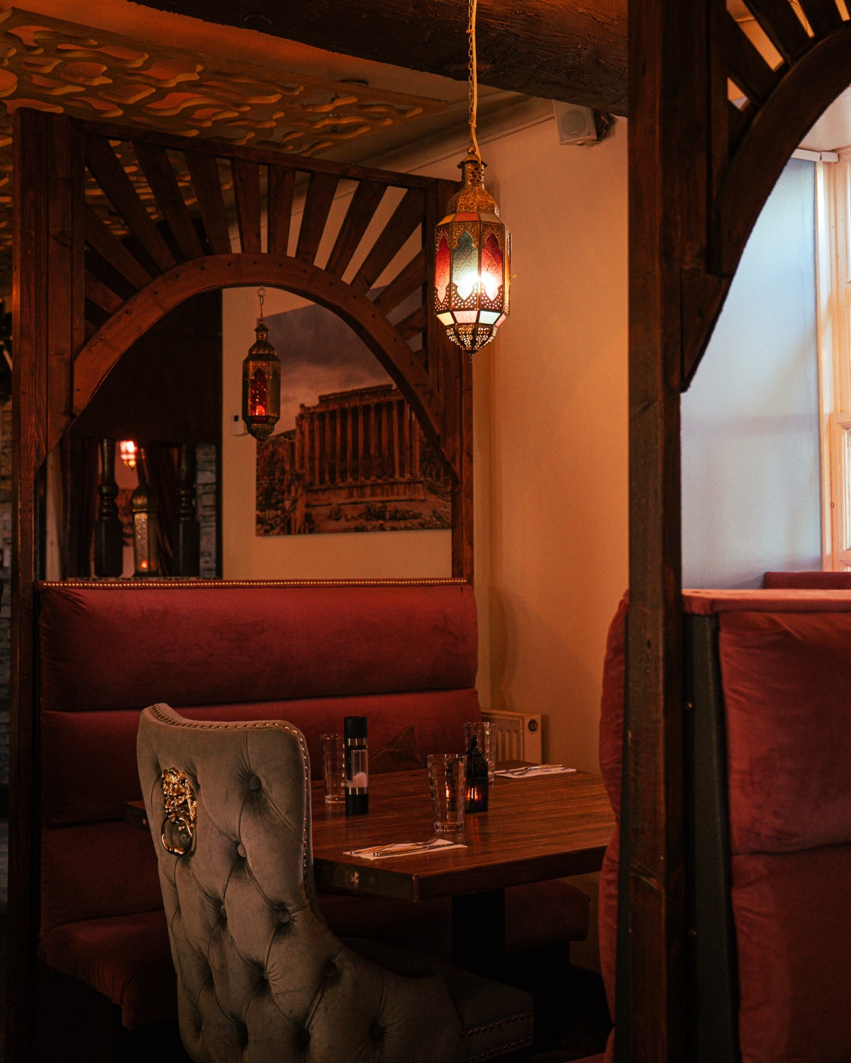 Warm interior with arches and lanterns at Beirut Restaurant, Edinburgh