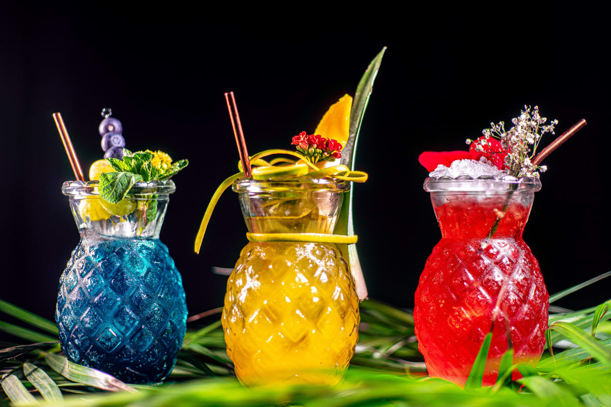 Tiki cocktails served in pineapple shaped glasses at Tantra, Edinburgh